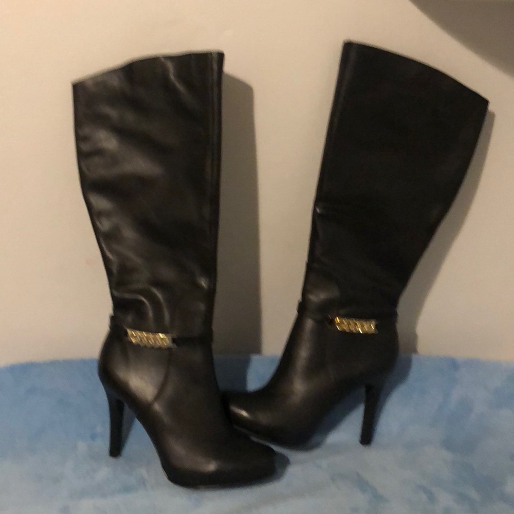 Tall leather black boots